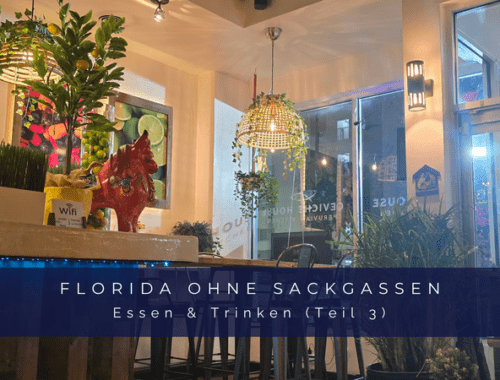 Cover-Bild "Florida ohne Sackgassen - Essen & Trinken (Teil 3)" in einem gemütlich beleuchteten Restaurant mit Zitronen-Deko und warmem Ambiente.